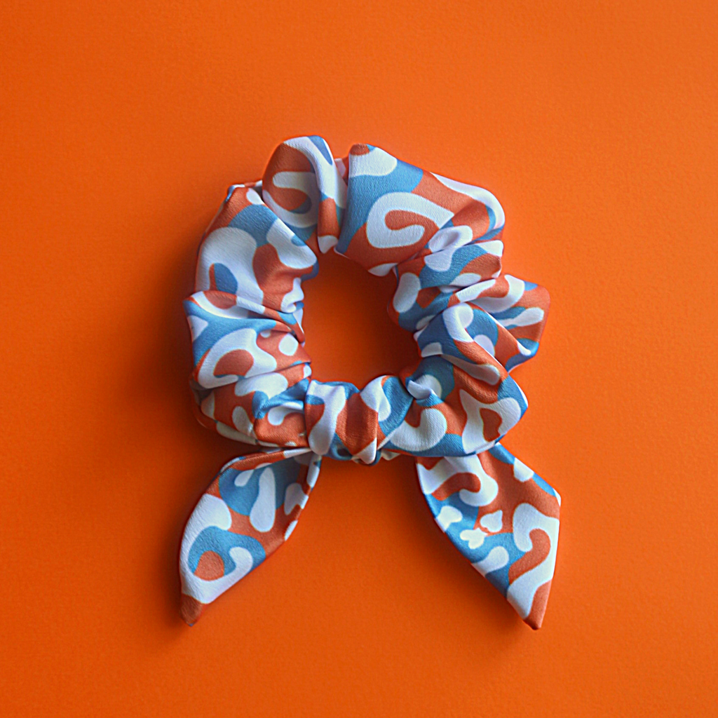 Orange leopard bow scrunchie